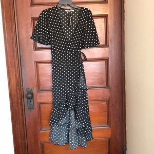 Black and white ruffled polka dot dress